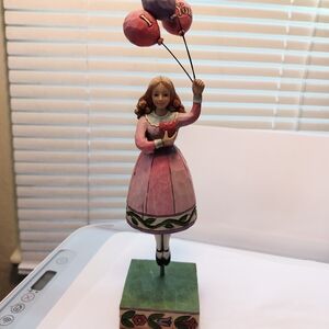 Pink Figurine with Balloons